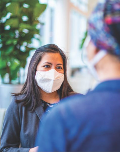 doctor speaking with family member