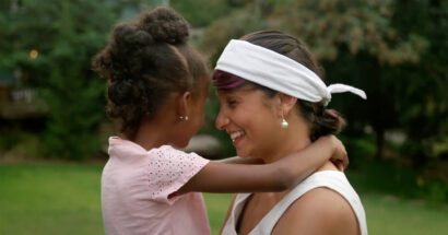 woman holding young girl