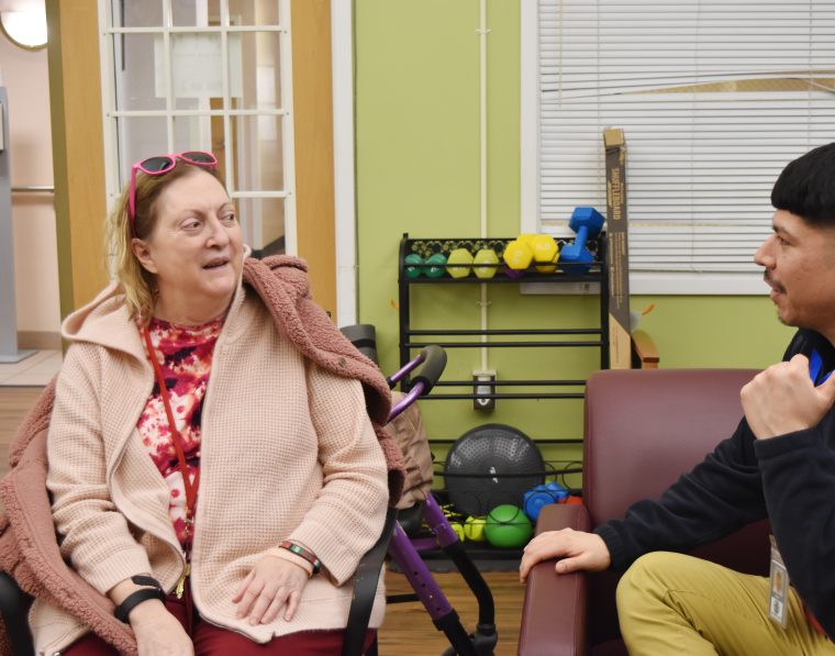 Sherril a Pathway Homes resident, speaks to a Resident Support Specialist Sherril a Pathway Homes resident, speaks to a Resident Support Specialist